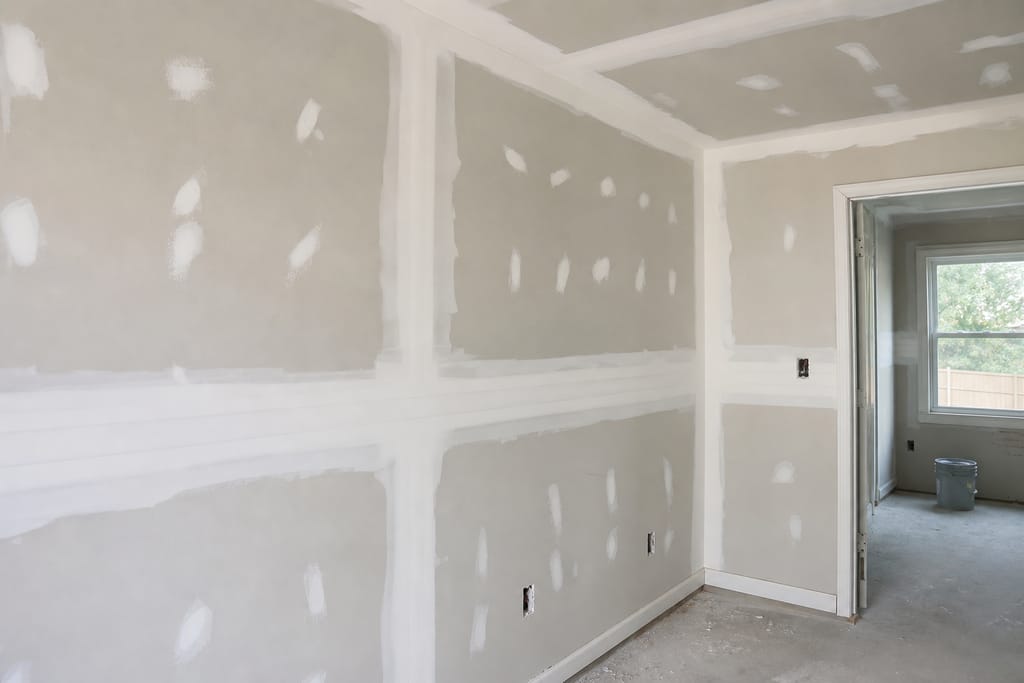 Removing damaged drywall photo
